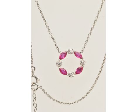 AN 18CT WHITE GOLD RUBY AND DIAMOND PENDANT NECKLACE, the pendant of a circular form set with four marquise cut rubies and fo
