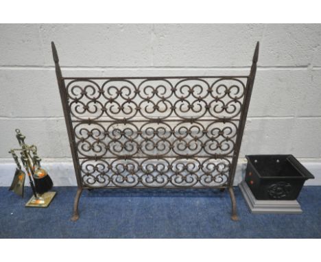 A WROUGHT IRON FIRE SCREEN, with repeating scrolled designs, height 73cm, a cast iron rain hopper, along with a companion set