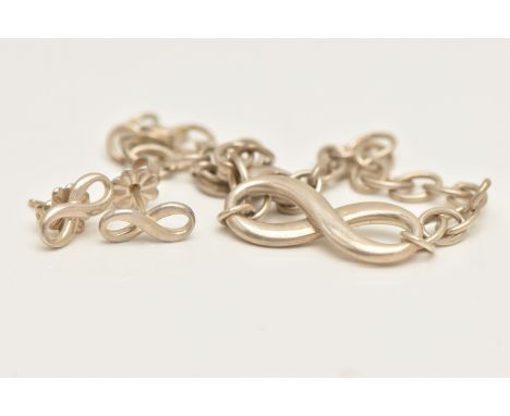 A 'TIFFANY &amp; CO' INFINITY BRACELET AND EARRINGS, curb link bracelet with a polished infinity charm, fitted with a lobster