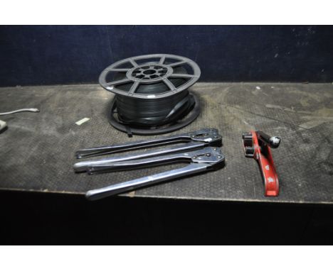 A SELECTION OF BANDING EQUIPMENT, including a reel of banding strapping, a tensioner and two clip clamps (4)