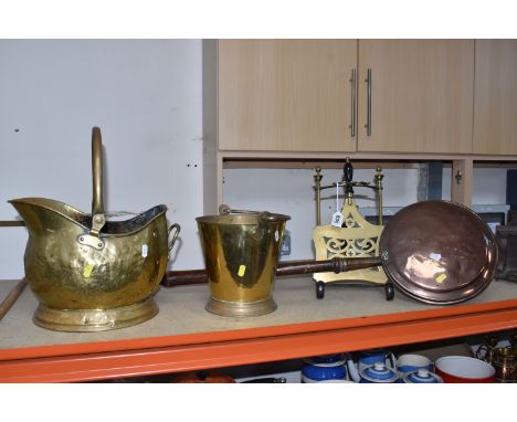 A GROUP OF BRASSWARE, to include a brass 'Helmet' coal scuttle, a brass bucket stamped Narang, an adjustable brass trivet and