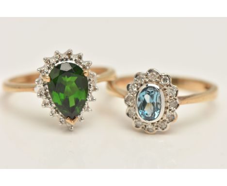 TWO GEM SET CLUSTER RINGS, the first an oval cut light blue sapphire collet set with a surround of single cut diamonds, yello