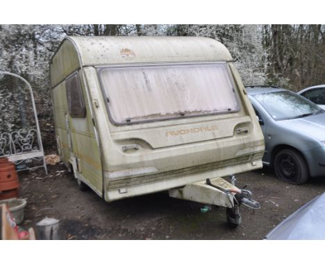 AN AVONDALE 4 BERTH CARAVAN with two bench seats, kitchen, shower room, total length from hitch to rear 500cm, external width