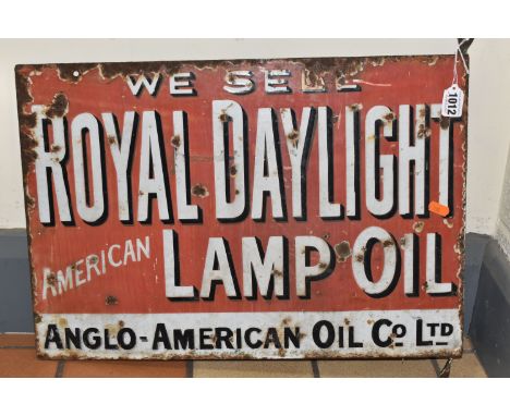 AN ORIGINAL EARLY 20TH CENTURY ENAMAL SHOP ADVERTISING SIGN, double sided with original fixing strip, 'We Sell Daylight Ameri