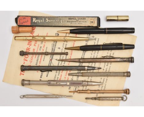 A SELECTION OF PENCILS, to include a small yellow metal, engine turned pattern propelling pencil unmarked, a small white meta