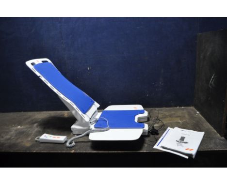 A DRIVE MOBILITY BELLAVITA ELECTRIC BATH SEAT, with manual, charger and remote (PAT pass and working)