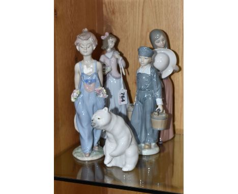 A GROUP OF FIVE LLADRO FIGURINES, comprising a 1996 Collector's Society 'Innocence in Bloom' figure No. 7644, designed by Jos