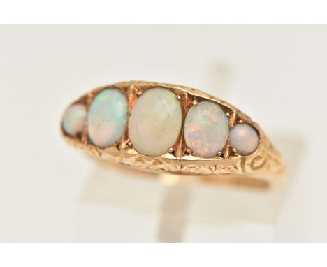 AN 18CT GOLD OPAL BOAT RING, early 20th century yellow gold ring set with five oval opals, scrolling detail to the gallery, h