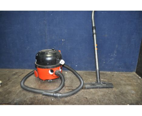 A NUMARK HVR-200-22 'HENRY' VACUUM CLEANER with pipework and floor head (PAT pass and working) Condition Report: pipe taped