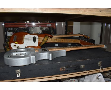 THREE SCRATCH BUILT GUITARS IN WOODEN CASES comprising a bass guitar with an electric input jack made from pine with an oak f