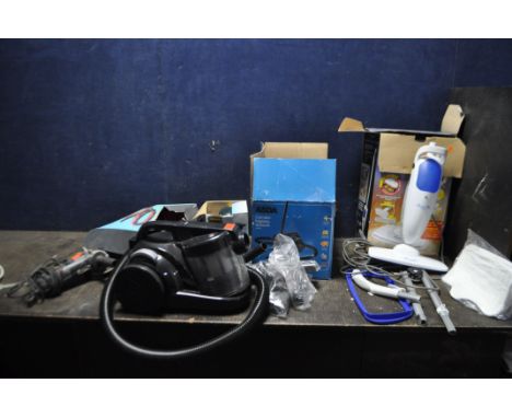 AN ASDA VACUUM CLEANER IN ORIGINAL BOX, a Light 'n' easi steam mop, a Wickes angle grinder (all PAT pass and working), a set 