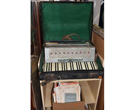 AN ESTRELLA ACCORDION AND A BOX OF SHEET MUSIC, one hundred and twenty buttons, pearlized finish, cased, together with a box 