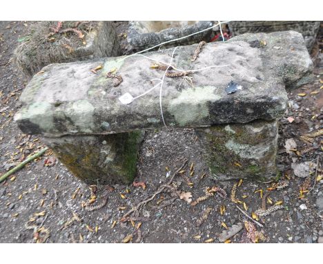 A SMALL GARDEN BENCH MADE UP FROM PERIOD SANDSTONE BLOCKS, width 68cm, depth 23cm, height 34cm. Condition Report: dated losse