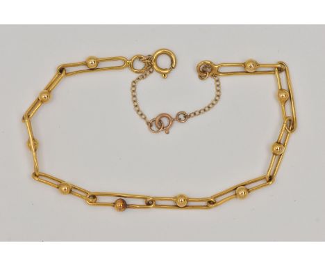A 9CT GOLD BRACELET, fancy links with applied bead work, fitted with a spring clasp and additional safety chain, hallmarked 9