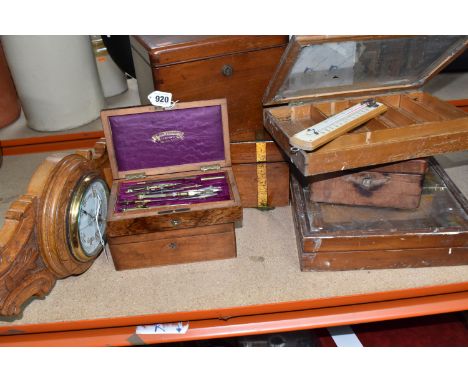 A GROUP OF WOODEN BOXES, comprising two glazed display cases, a Victorian writing box, an early 20th century geometry set, an