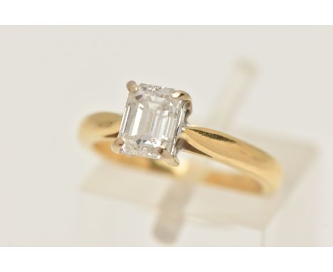 AN 18CT GOLD SINGLE STONE DIAMOND RING, a single emerald cut diamond, prong set in white gold, estimated diamond weight 0.90c