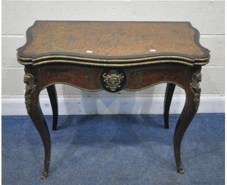 A FRENCH LOUIS XV STYLE EBONISED, BRASS AND TORTOISESHELL BOULLE WORK GAMES / CARD TABLE, c1870, the revolving fold over top 