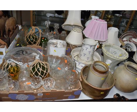 TWO BOXES AND LOOSE GLASS, LAMPS AND SUNDRY ITEMS, to include two oil lamps, one of column style with a glass reservoir, four