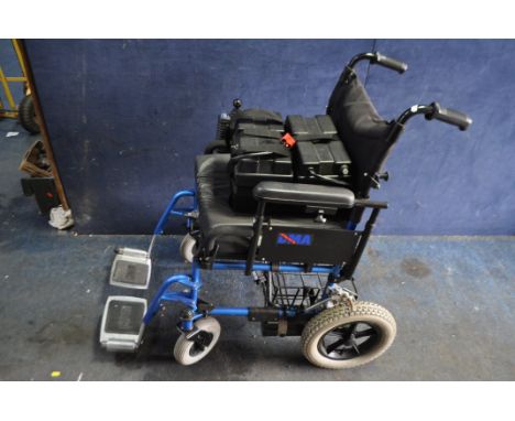 A DMA ELECTRIC WHEELCHAIR WITH NO BATTERIES OR CHARGER, with two footrests