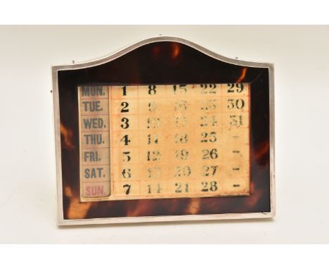 A SILVER AND TORTOISESHELL PERPETUAL DESK CALANDER, silver frame hallmarked 'Walker &amp; Hall' Birmingham rubbed, with a tor