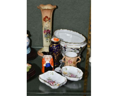 A GROUP OF CERAMICS, comprising a Royal Worcester blush ivory vase, shape no G1015, the moulded body printed and tinted with 