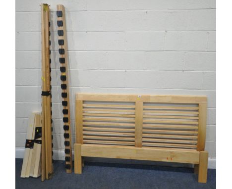A MODERN BEECH 5FT BEDSTEAD, with siderails, slats, central support beam, and bolts, condition report: general signs of usage