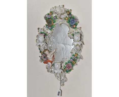A SITZENDORF PORCELAIN CANDELABRA MIRROR with a moulded floral frame with a figure of a cherub to the lower left side, three 