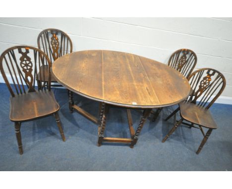 A 20TH CENTURY OAK BARLEY TWIST GATE LEG TABLE, open width 148cm x closed width 52cm x depth 104cm x height 74cm, a set of fo