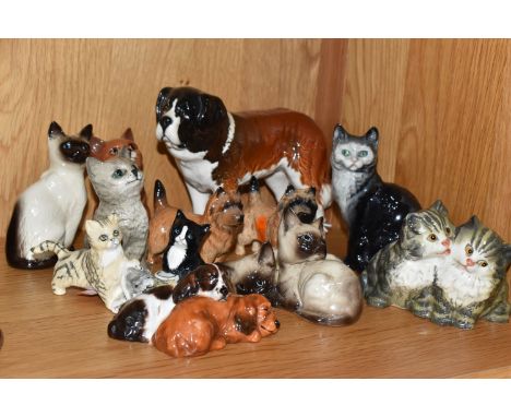 A GROUP OF BESWICK AND DOULTON FIGURINES to include eight Beswick figurines comprising a St Bernard No. 2221 marked 'Corna Ga