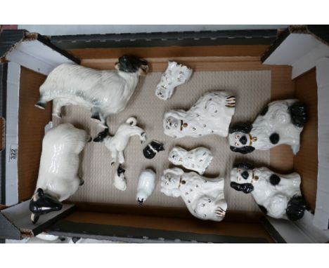 A mixed collection of items to include: Melba Ware Sheep, Staffordshire type dogs etc