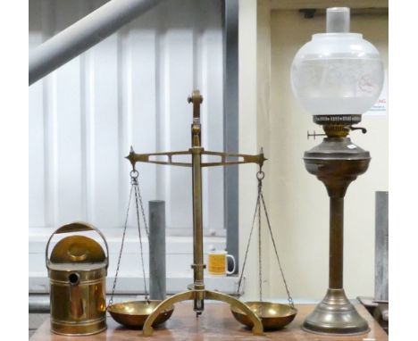 Early 20th Century brass items to include: Oil Lamp, Shop Scales and watering can (3)