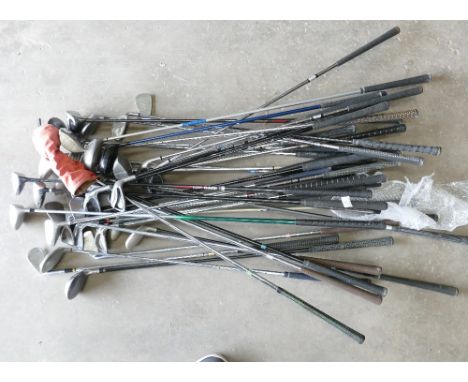 A large collection of golf clubs: to include drivers, putters etc. Makes are of Slazenger, Alpha, Dunlop, Donay etc Approx 41