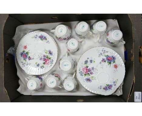 A collection of floral Crown Staffordshire saucers, plates &amp; cups, 11 saucers / 9 cups