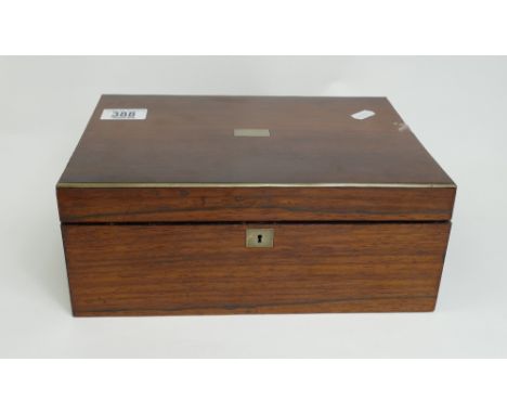 Rosewood &amp; brass box: Empty 19th century sewing box measuring 28cm x 19cm x 11cm. Section of brass missing on one side.