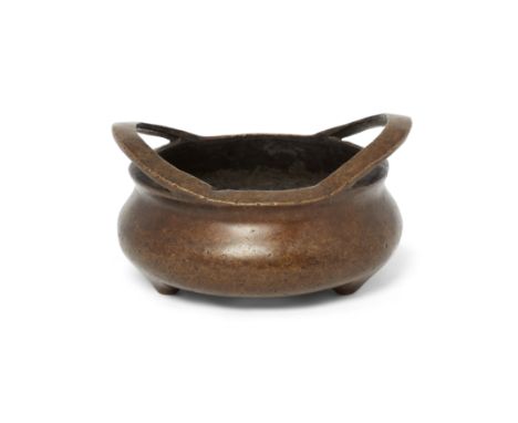 A Chinese tripod bronze incense burnerQing dynasty, 19th century, apocryphal Xuande sixteen-character markWith everted loop h