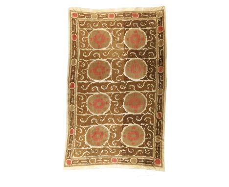 To Be Sold With No ReserveAn embroidered wedding Susani, Samarkand, Uzbekistan, 20th century, in cream, gold and light brown,