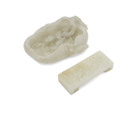 Two Chinese jade carvings20th centuryComprising a realistically carved brush washer in form of a lotus leaf with incurved edg