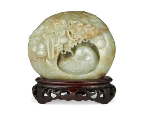 A Chinese green jade 'Mandarin duck' boulder carving20th centuryThe large green jade boulder deeply carved with a mandarin du