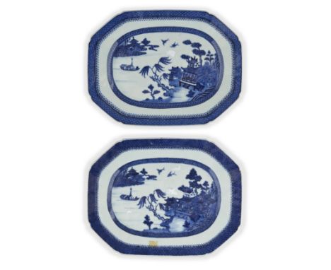 A pair of blue and white 'landscape' tureen standsQing dynasty, Qianlong periodEach decorated with a central riverscape scene