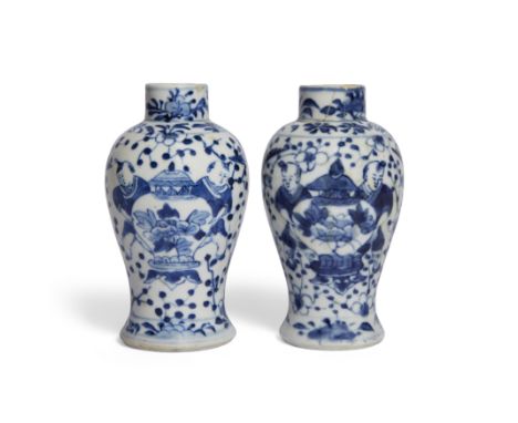 A pair of Chinese blue and white 'boys' vasesQing dynasty, 19th century, apocryphal Kangxi marksOf baluster form, each painte