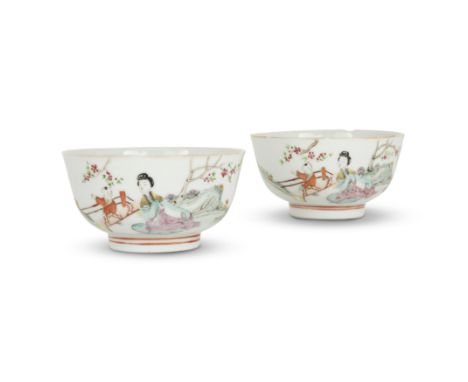 A pair of Chinese famille rose 'lady and boy' bowlsRepublic period, apocryphal Tongzhi four-character marksPainted to the ext