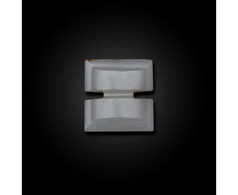 A Chinese carved white jade pendantMing dynasty Carved in the form of a Sinan compass, 2.2cm wide明 '工'字玉珮 Condition Report:  