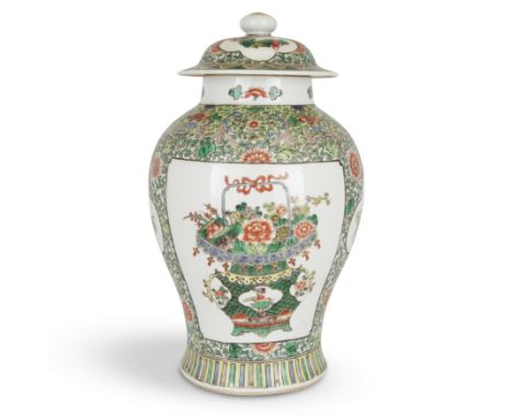 A large Chinese famille verte jar and coverQing dynasty, 19th centurySet to the body with two main reserves of vases issuing 