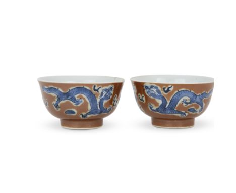A pair of Chinese cafe-au-lait and blue 'dragon' bowlsQing dynasty, 19th century, apocryphal Kangxi four character marksPaint