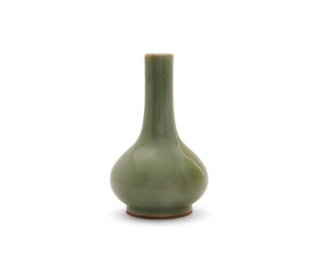 A Chinese celadon bottle vaseLate Qing/Republic periodRaised on short straight foot to compressed globular body sweeping up t