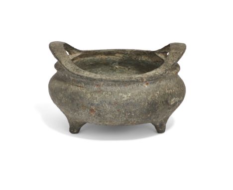 A Chinese bronze tripod incense burner20th century, apocryphal Xuande markOf bombé form, with paired everted loop handles jut