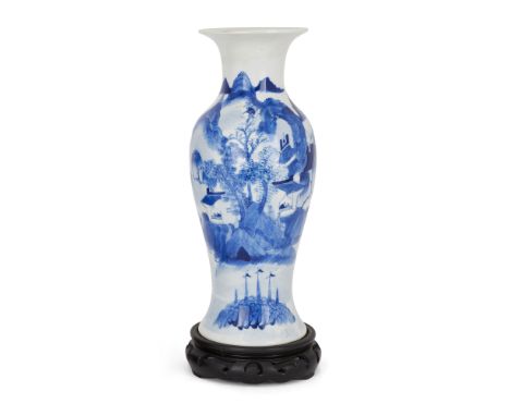 A Chinese blue and white ‘landscape’ baluster vaseQing dynasty, 19th centuryRising from short stepped foot, painted with tree