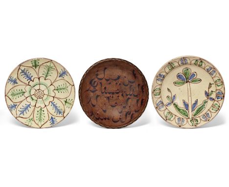 To Be Sold With No ReserveThree pottery dishes,Southern Spain or North Africa, 20th/21st century,the first with central flora