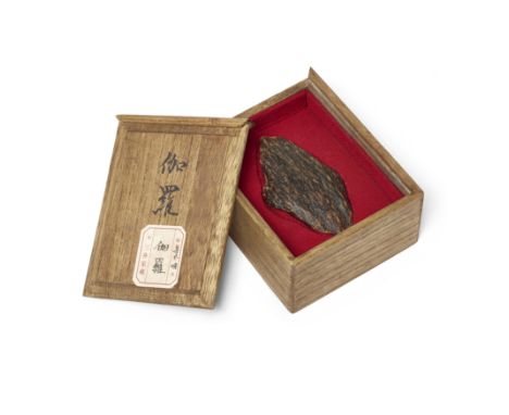 A Japanese KyaraShowa period, Circa 1961The aromatic wood of irregular shape, 9cm long, with fitted Japanese box.Provenance: 