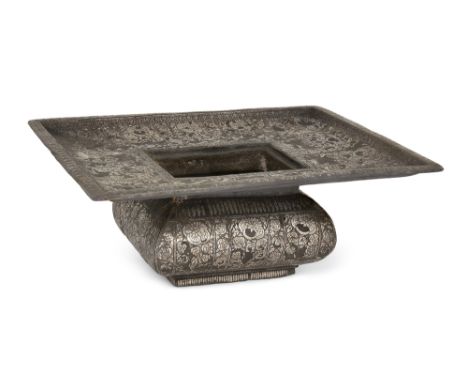 A silver-inlaid bidri basin, Bidar, Deccan, India, 18th century,of rectangular form, on a short foot, the square body with cu